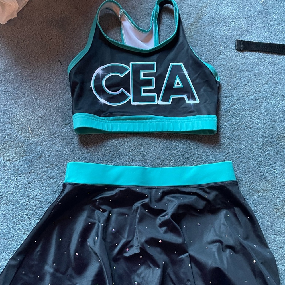 Matching cheer extreme set sports bra and flouncy skirt with sequins